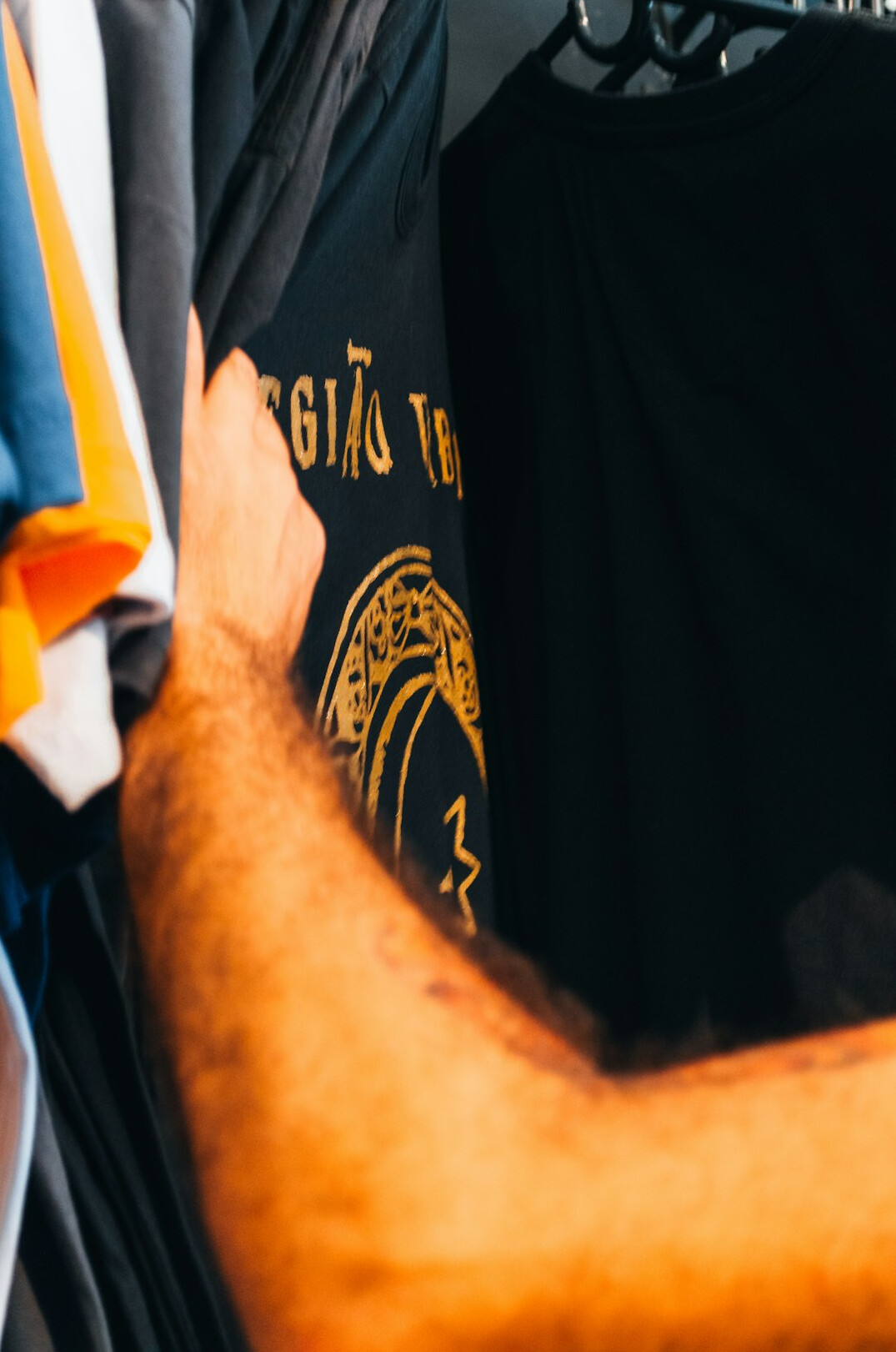 man hiding merchandise