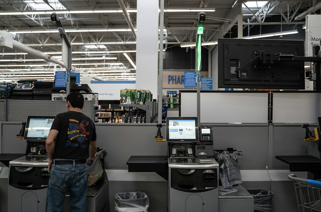 store security guard watching monitors